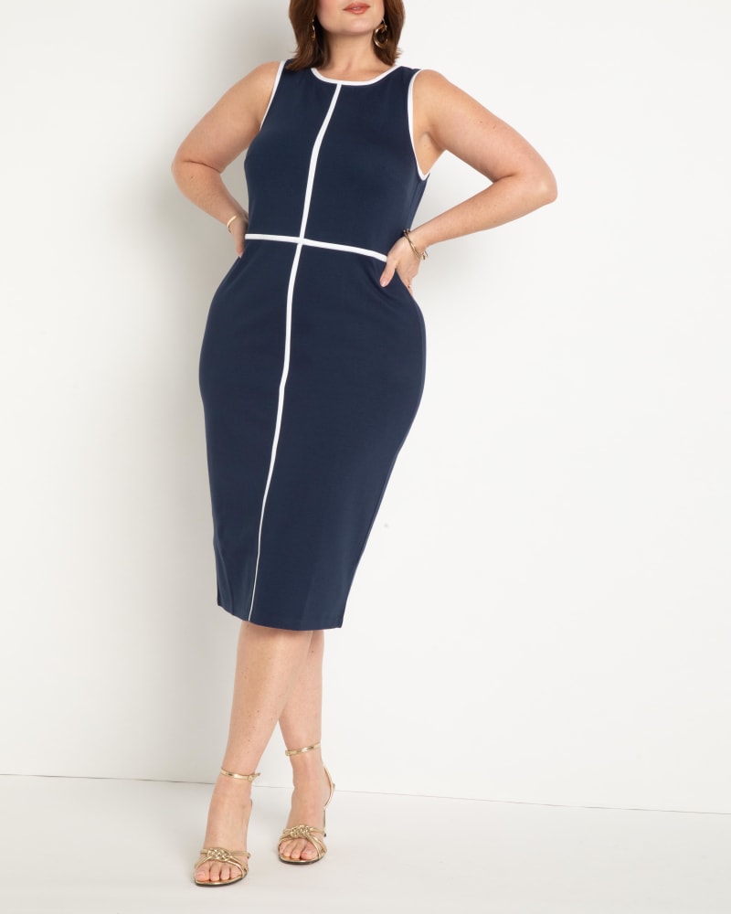 Front of a model wearing a size 24 Sleeveless Piped Workwear Dress in Navy With White Piping by ELOQUII. | dia_product_style_image_id:294968
